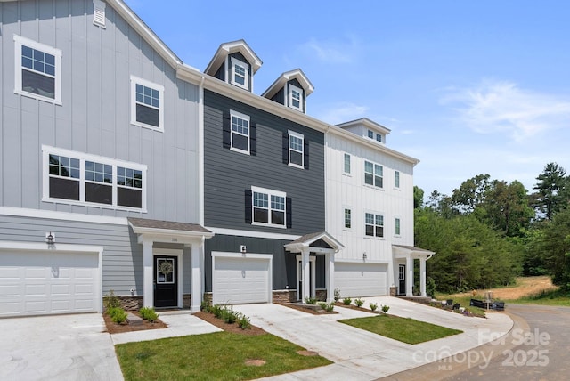 190 Cherry Springs Ln Unit 1-E, Asheville, NC 28804 - multi unit property featuring driveway, an attached garage, board and batten siding, and stone siding