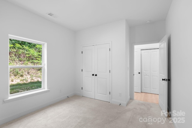 190 Cherry Springs Ln Unit 1-E, Asheville, NC 28804 - unfurnished bedroom featuring carpet and baseboards