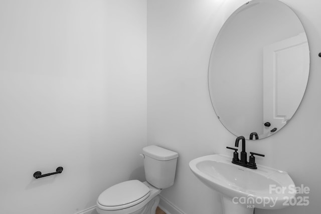 190 Cherry Springs Ln Unit 1-E, Asheville, NC 28804 - bathroom with toilet, baseboards, and a sink