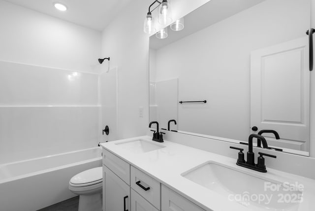 190 Cherry Springs Ln Unit 1-E, Asheville, NC 28804 - bathroom featuring toilet, double vanity, and shower / tub combination