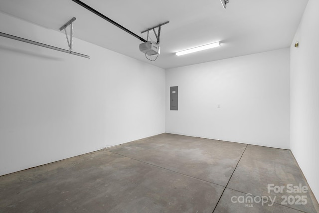 190 Cherry Springs Ln Unit 1-E, Asheville, NC 28804 - garage with electric panel and a garage door opener