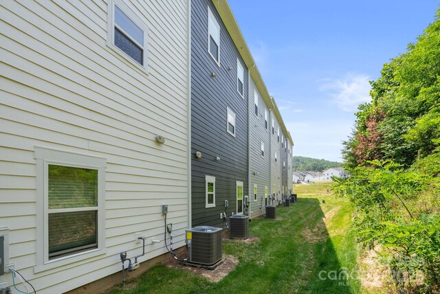 190 Cherry Springs Ln Unit 1-E, Asheville, NC 28804 - view of side of property featuring cooling unit and a yard
