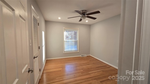 unfurnished bedroom featuring recessed lighting, a ceiling fan, visible vents, baseboards, and light wood finished floors