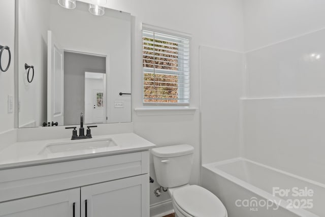 full bathroom featuring vanity, shower / washtub combination, and toilet