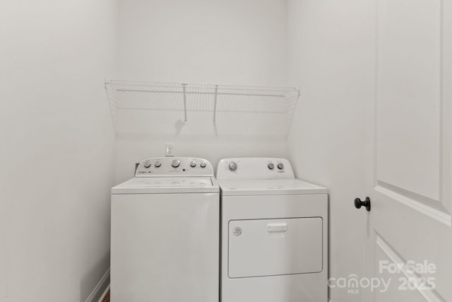 laundry room with washer and clothes dryer