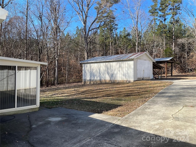 view of outdoor structure with a lawn