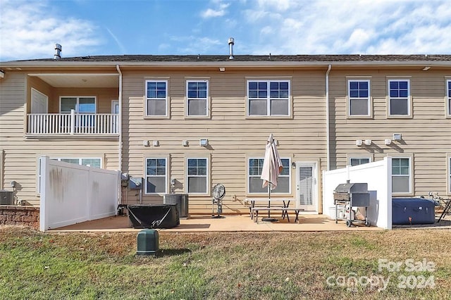 back of house featuring a patio