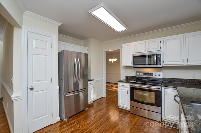 kitchen featuring crown molding, dark hardwood / wood-style flooring, white cabinets, and appliances with stainless steel finishes