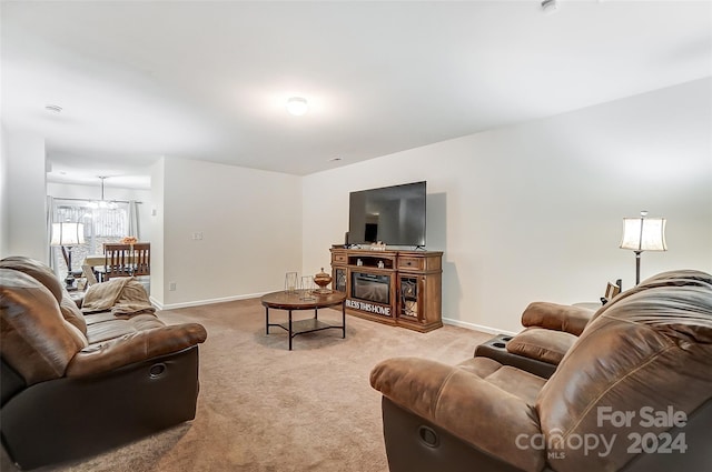 living room featuring light carpet