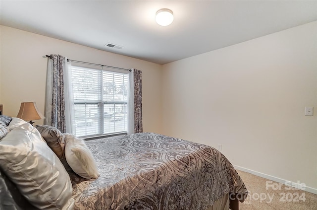 bedroom featuring carpet