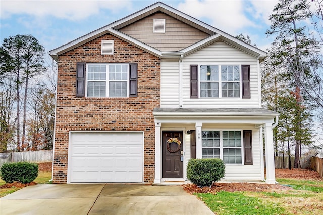 front of property with a garage