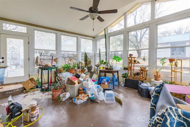 sunroom featuring a wealth of natural light, ceiling fan, and lofted ceiling