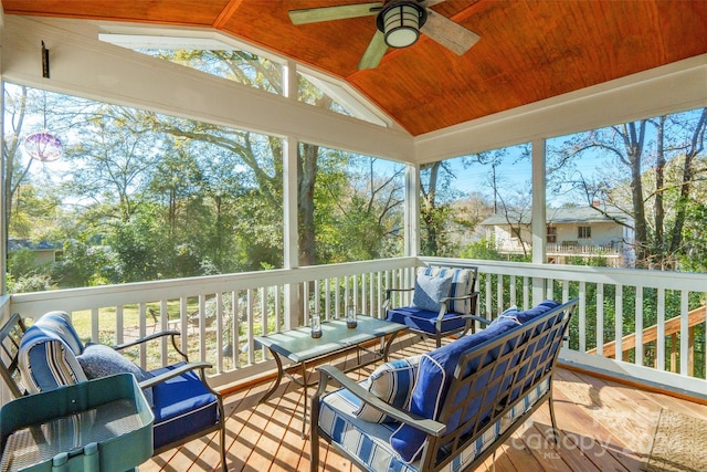 sunroom / solarium featuring vaulted ceiling and ceiling fan