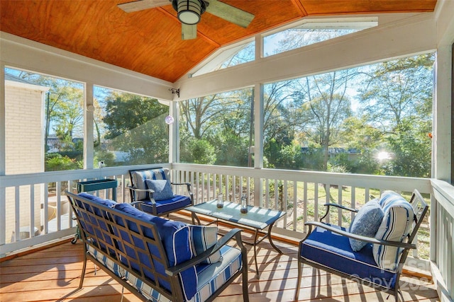 sunroom / solarium with vaulted ceiling and ceiling fan