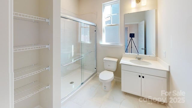 9601 Pointer Rd Unit 77, Huntersville, NC 28078 - bathroom with vanity, toilet, and an enclosed shower