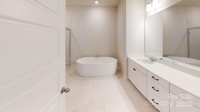 9601 Pointer Rd Unit 77, Huntersville, NC 28078 - bathroom with vanity and a tub