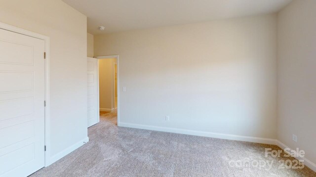 9601 Pointer Rd Unit 77, Huntersville, NC 28078 - unfurnished bedroom featuring light carpet