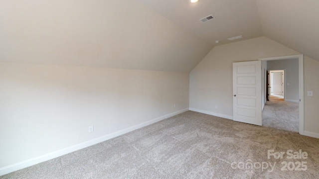 9601 Pointer Rd Unit 77, Huntersville, NC 28078 - additional living space featuring light colored carpet and vaulted ceiling
