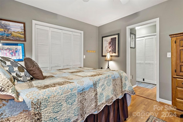 bedroom featuring a closet, light hardwood / wood-style flooring, and ceiling fan