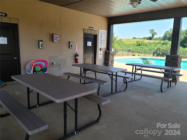 view of patio with a community pool