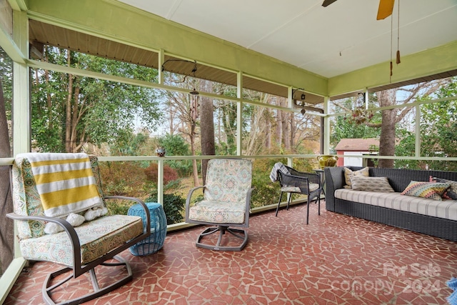 sunroom / solarium with ceiling fan and plenty of natural light