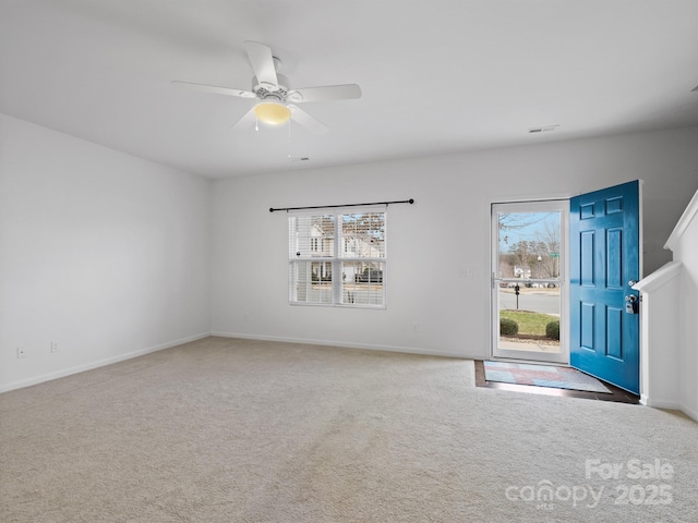 interior space with ceiling fan and plenty of natural light