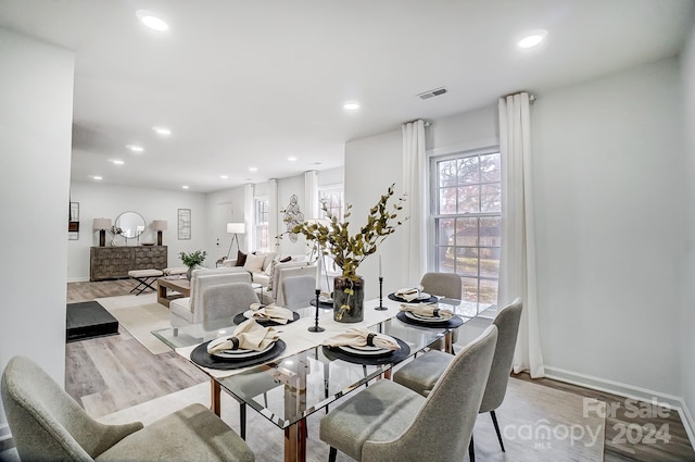 dining room featuring light hardwood / wood-style flooring