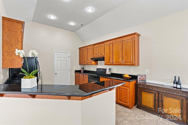 kitchen featuring black appliances, vaulted ceiling, light tile patterned floors, kitchen peninsula, and a breakfast bar area