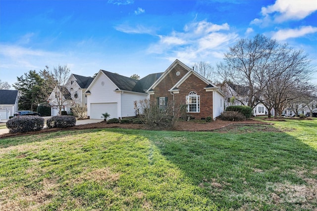 view of front of property featuring a garage and a front yard