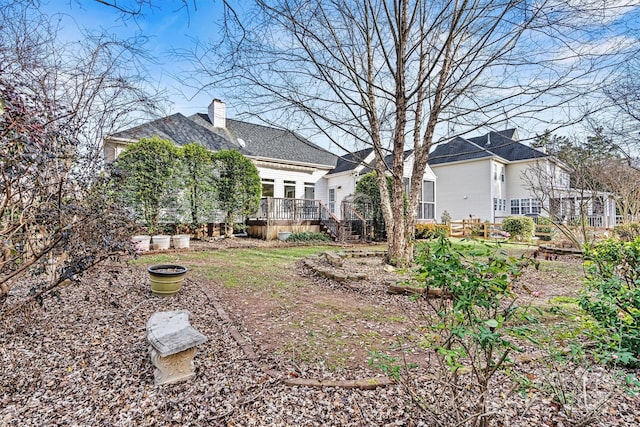 view of yard with a wooden deck