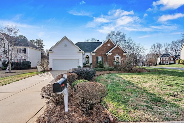 view of front of property with a garage and a front lawn