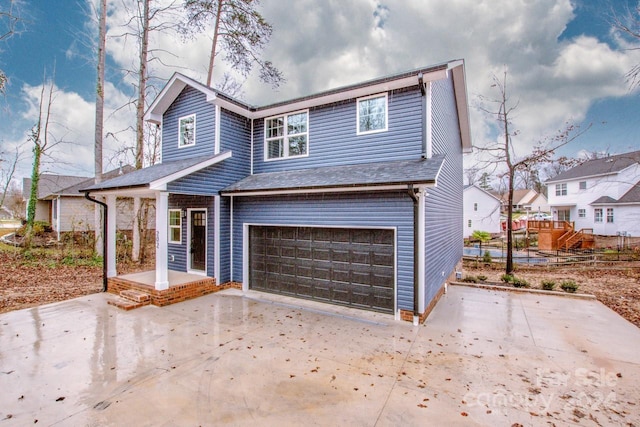 view of property with a garage