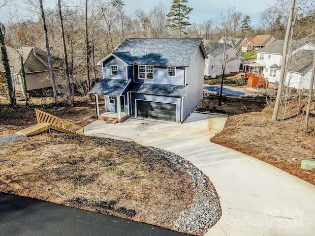 view of front of property with a garage