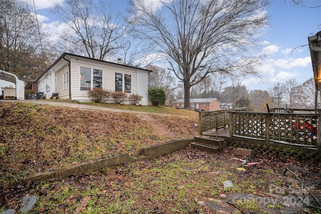 view of yard featuring a deck