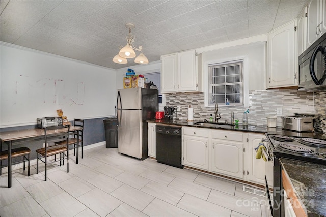 kitchen featuring black appliances, backsplash, white cabinetry, and sink