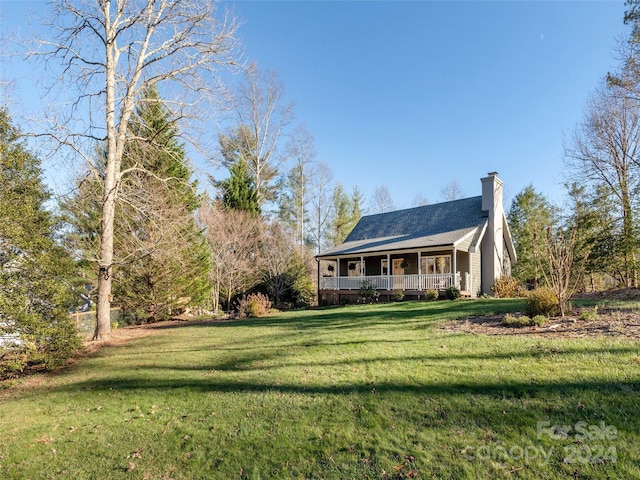 exterior space featuring a front yard and a porch