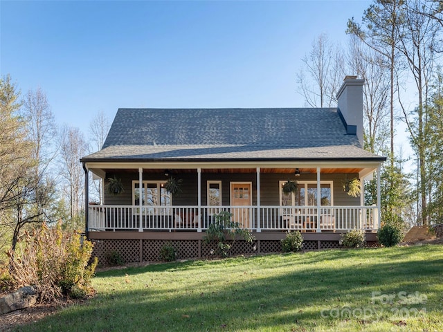 view of front of house featuring a porch and a front yard