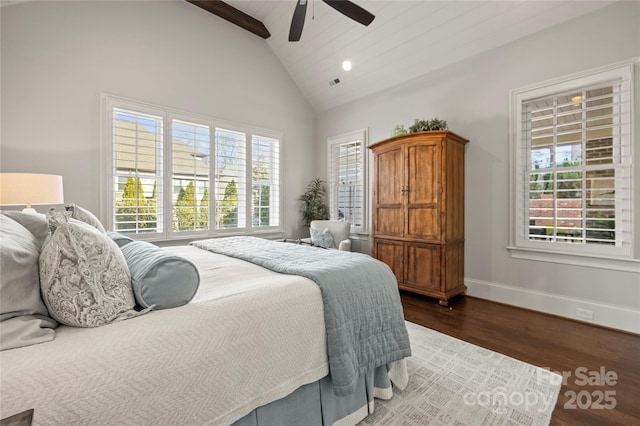 bedroom featuring visible vents, a ceiling fan, wood finished floors, high vaulted ceiling, and baseboards