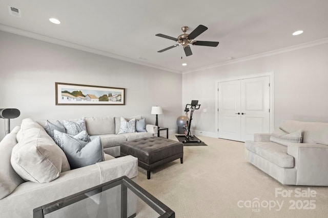 living area with ornamental molding, recessed lighting, and carpet flooring