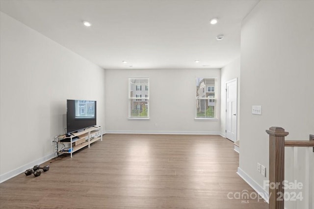 unfurnished living room featuring light wood-type flooring