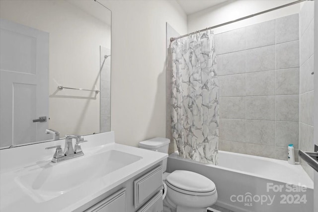 full bathroom featuring vanity, toilet, and shower / tub combo