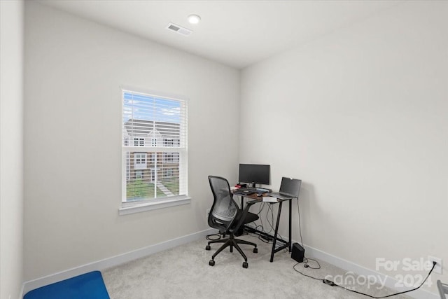 view of carpeted office space