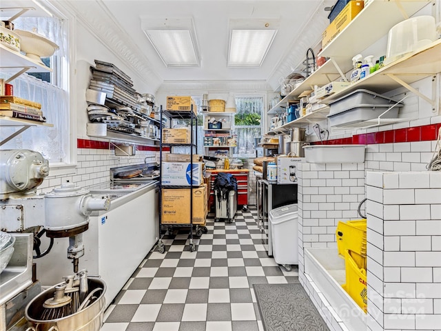 kitchen with decorative backsplash and crown molding