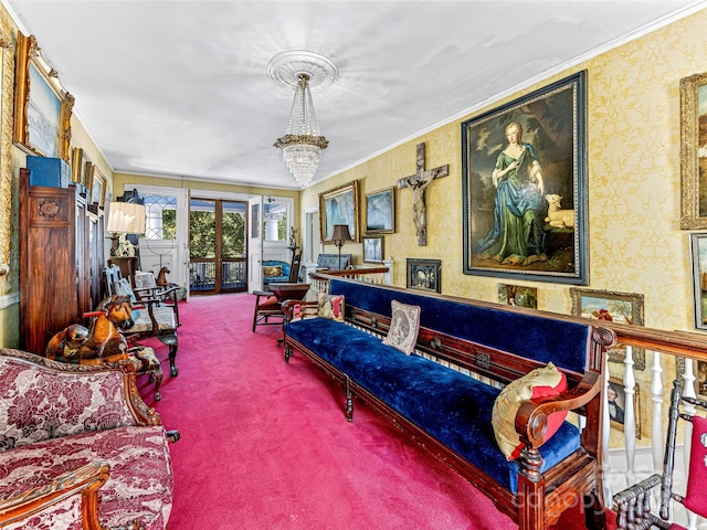 carpeted living room featuring crown molding, french doors, and a chandelier