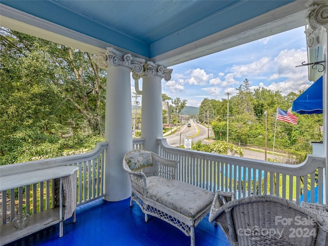 wooden deck featuring covered porch