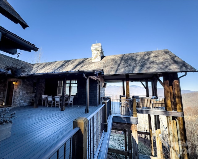 wooden terrace with a mountain view