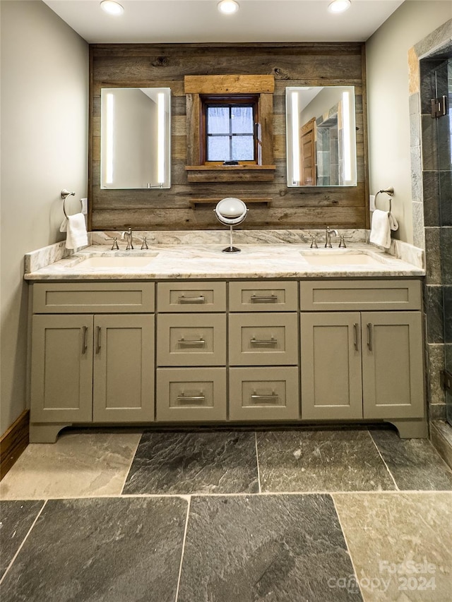 bathroom featuring decorative backsplash and vanity