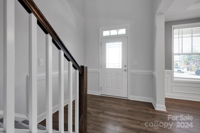 foyer with dark hardwood / wood-style flooring