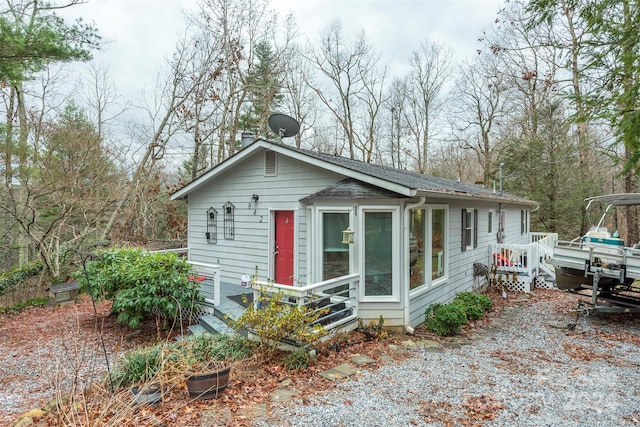 view of front of property featuring a wooden deck