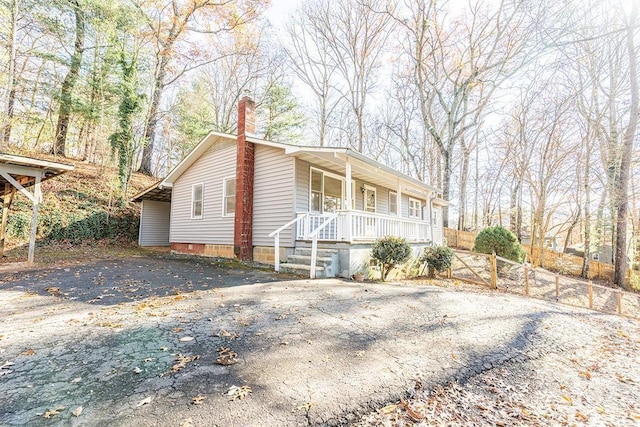 view of home's exterior featuring a porch